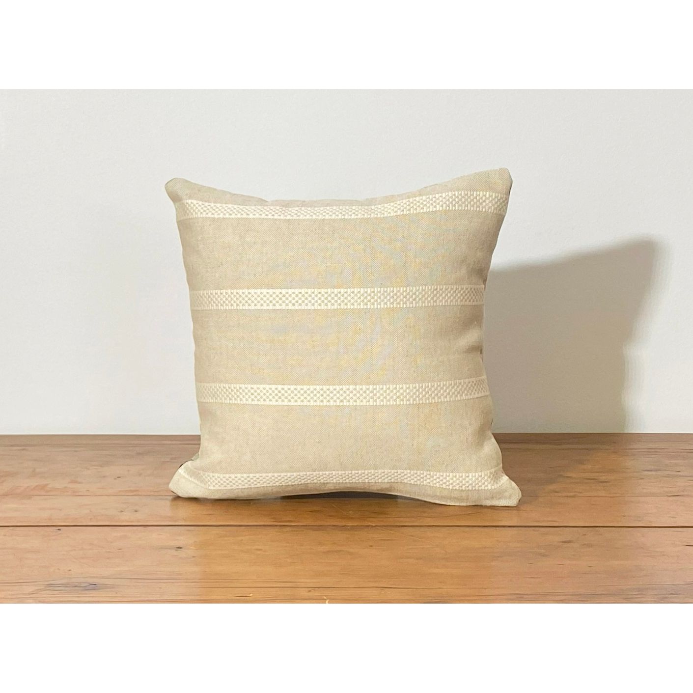 Chelsea So Cute cushion - back view with striped linen
