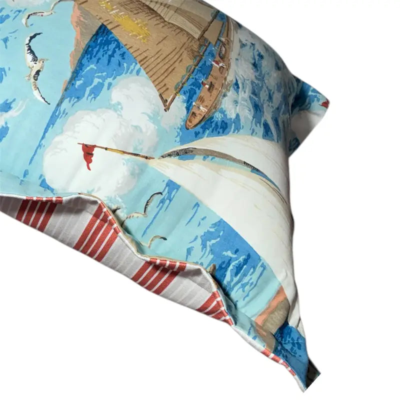 Decorative pillow with sailboat design side view
