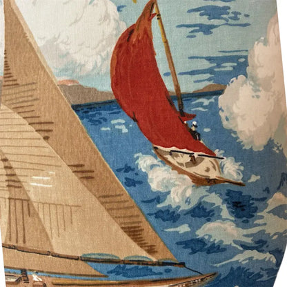 Sailboat scene with red sail and brown sails against a blue sky and clouds.