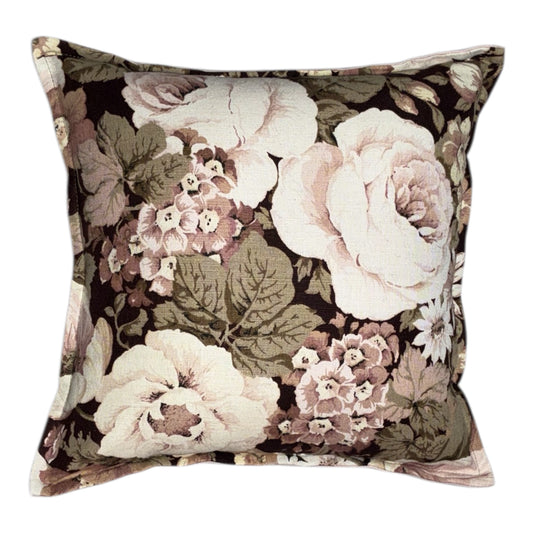 Floral patterned pillow with pink and white flowers 